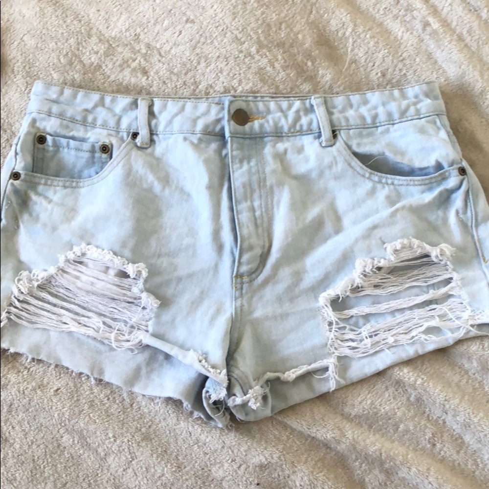 high waisted light wash distressed shorts
